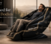 Tall user relaxing in a luxury Kollecktiv massage chair with extended L-track and adjustable footrest designed for full-body coverage and comfort